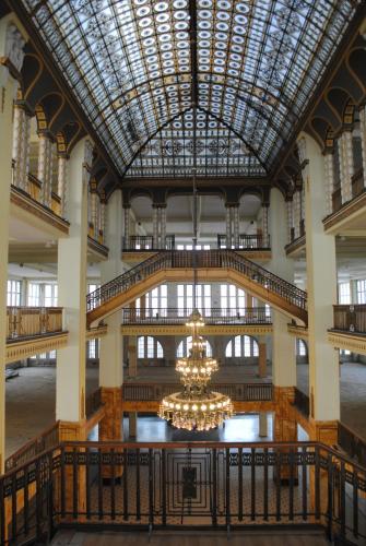 a large building with a chandelier in the middle at Parkhotel Görlitz in Görlitz