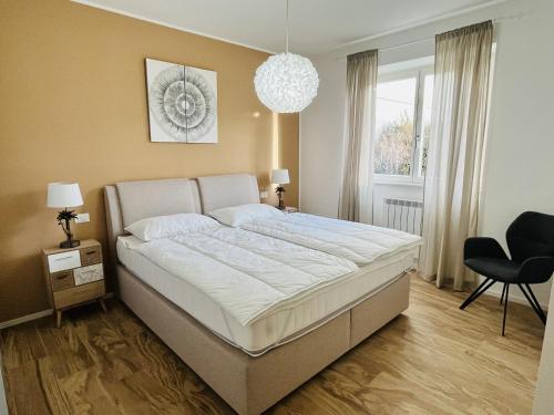 Кровать или кровати в номере Residence La Villa Kalliste