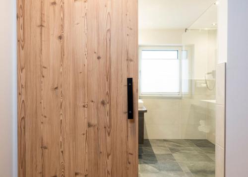 A bathroom at Hotel Brunner - Reiteralm