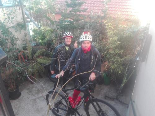 two people wearing helmets are sitting on a bike at Plan B in Imperia