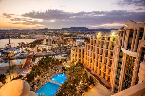an aerial view of a city with a resort at Queen of Sheba Eilat in Eilat