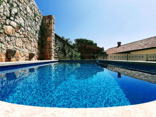 Πισίνα στο ή κοντά στο Holiday home in Saftici 26679