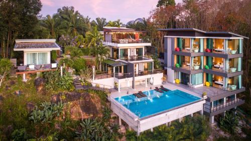 an aerial view of a house with a swimming pool at Ao Luek Panoramic Pool-SHA Plus in Ao Luk