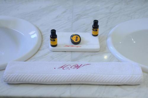 a towel on a counter next to a sink at Washington Hotel in Casablanca