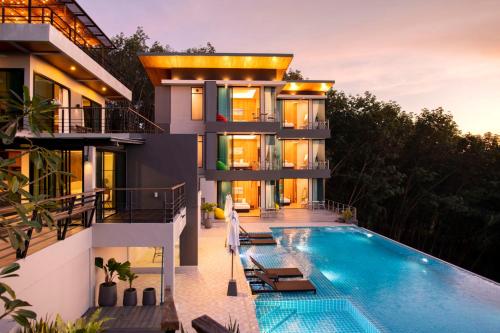 an image of a house with a swimming pool at Ao Luek Panoramic Pool-SHA Plus in Ao Luk