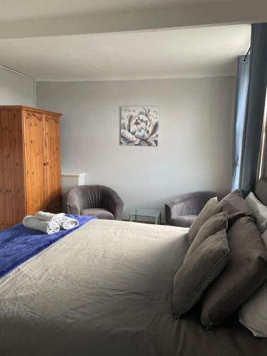 Postel nebo postele na pokoji v ubytování Whiteways Guest House