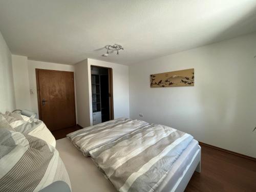 a bedroom with two beds in a room at Ferienwohnung Haus Brenner in Seeg