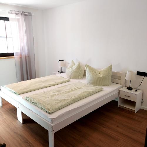 Postel nebo postele na pokoji v ubytování Ferienwohnung Familie Roth