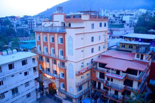 a view of a building in a city at Arogyadham Wellness Retreat in Rishīkesh