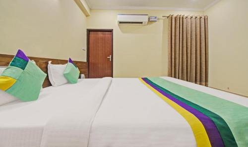 Postel nebo postele na pokoji v ubytování Hotel Rama Hindustani