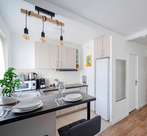 Photo de la galerie de l'établissement Le Lys - Studio proche Gare de Poissy, à Poissy