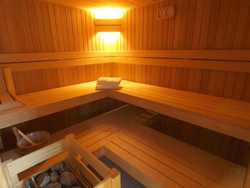 an inside of a sauna with a light in it at Private House in Blankenberge