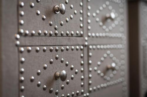 a close up of a metal object with silver rivets at Hotel Plas Hyfryd in Narberth