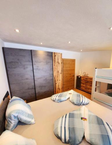 a bedroom with two beds with pillows on it at Mountain JoLe in Neustift im Stubaital