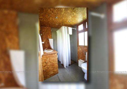 Letto o letti in una camera di Lisboa Bungalows