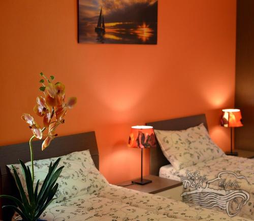 Postel nebo postele na pokoji v ubytování B&B DEA
