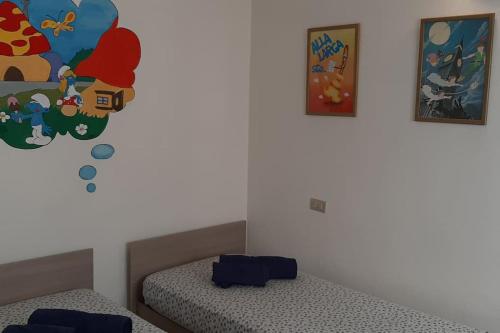 A bed or beds in a room at House Marika