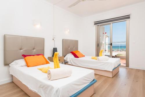 Posteľ alebo postele v izbe v ubytovaní Seaside House 4, Alcudia Beach