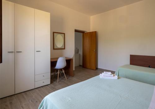 Cama ou camas em um quarto em Santamaria Village Resort Ascea