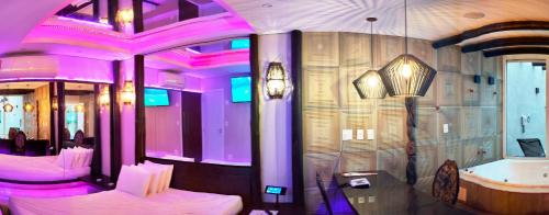 Et badeværelse på Motel Le Monde (Adult Only)