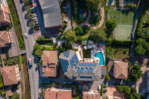 an aerial view of a house with a pool at Hotel Imperial ***S in Garda