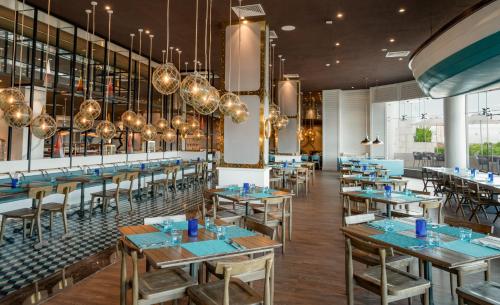 En restaurant eller et andet spisested på Nickelodeon Hotels & Resorts Riviera Maya - Gourmet All Inclusive by Karisma