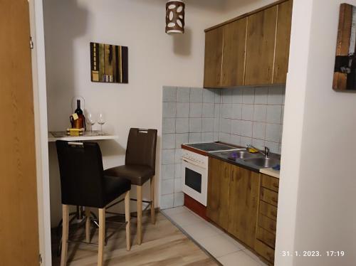 Virtuvė arba virtuvėlė apgyvendinimo įstaigoje Apartman 2B