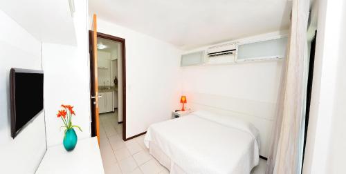 Ένα ή περισσότερα κρεβάτια σε δωμάτιο στο KING's FLAT HOTEL NATAL