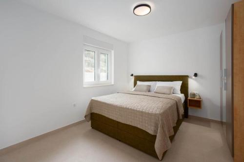 Krevet ili kreveti u jedinici u okviru objekta Apartment Pilic