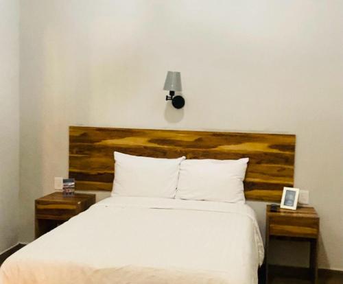 Cama o camas de una habitación en Palacio de las Rosas