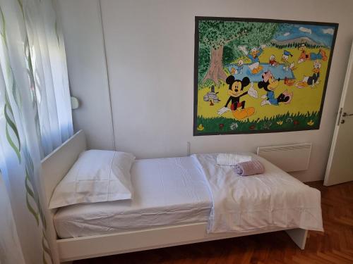 Una cama o camas en una habitación de Nani