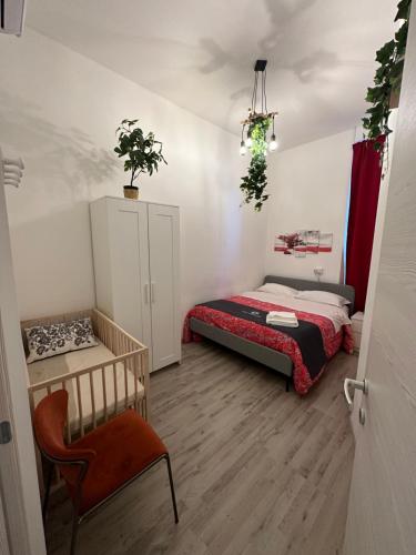 En eller flere senge i et værelse på Dea Dreams APARTMENT Piazzale Lodi Wi-Fi Metro a 2 passi