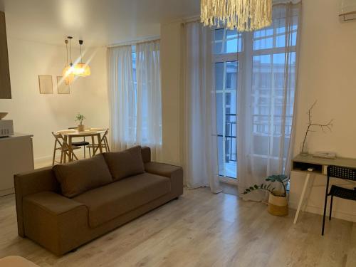 Ruang duduk di Boho квартира у моря ЖК Парк Фонтанов