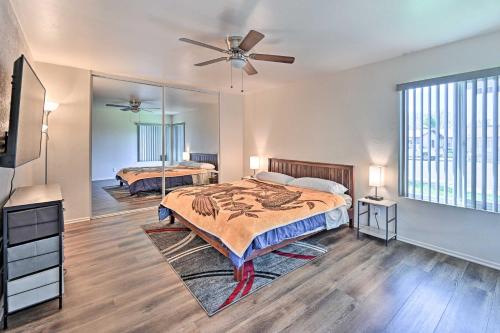 a bedroom with two beds and a ceiling fan at Family-Friendly Oceanside Home 5 Mi to Beach in Oceanside
