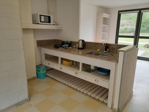 Η κουζίνα ή μικρή κουζίνα στο Aguamansa Apart
