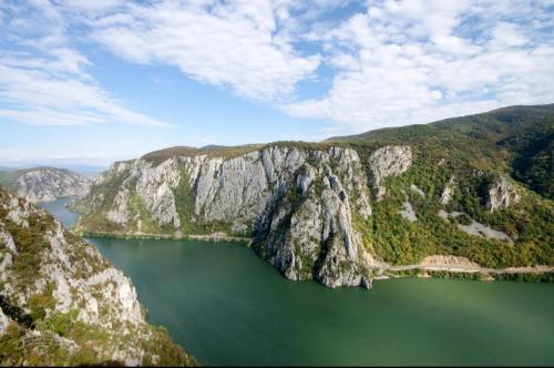 an aerial view of a mountain with a body of water at Escape in Dubova