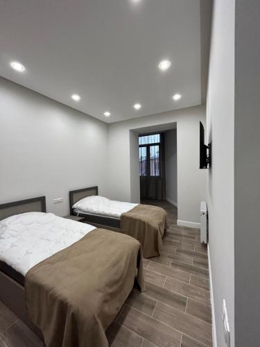 Llit o llits en una habitació de Cozy apartment
