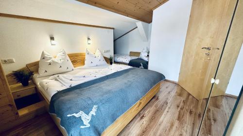 Posteľ alebo postele v izbe v ubytovaní Ferienwohnung Steinernes Meer