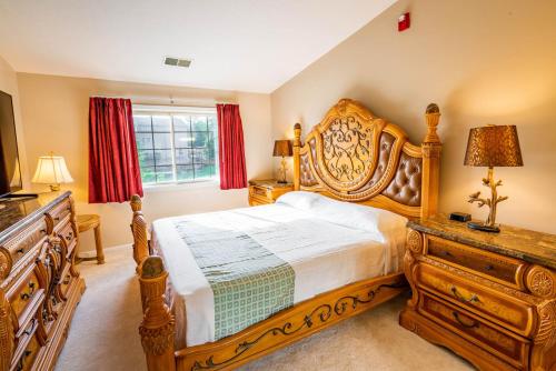 Krevet ili kreveti u jedinici u okviru objekta Grand Wood Suites
