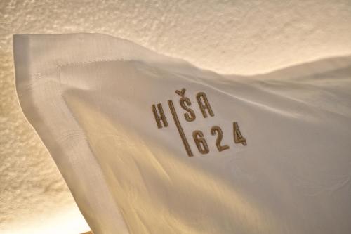 a white wedding veil with the word hsa on it at Hisa 1624 - Adults Only in Zgornja Kungota