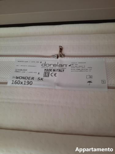a white box with a label on top of it at Casa di Cìì in Porto San Giorgio