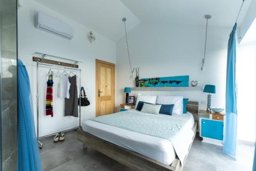 Кровать или кровати в номере Luxury Holidays & Events - Villa Diva - Montenegro