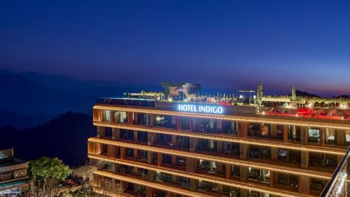 a night view of the hotel moco at Hotel Indigo Alishan by IHG in Fanlu