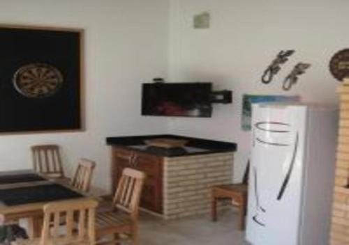 Köök või kööginurk majutusasutuses Casa Sonia&Rei em condo fechado, vista para o jardim