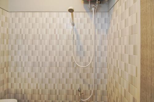 Koupelna v ubytování Urbanview Hotel Arafuru Residence Duren Sawit