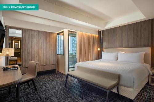 Katil atau katil-katil dalam bilik di Oakwood Suites Kuningan Jakarta