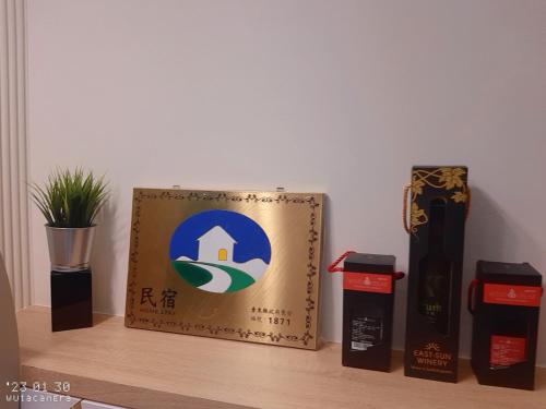 Certifikát, hodnocení, plakát nebo jiný dokument vystavený v ubytování 台東有點田民宿
