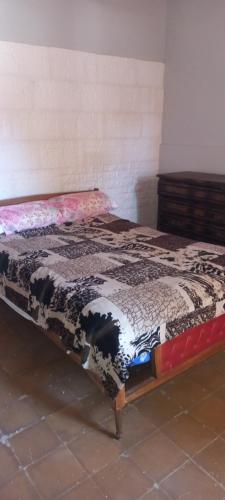 Una cama o camas en una habitación de Hostel Paraíso