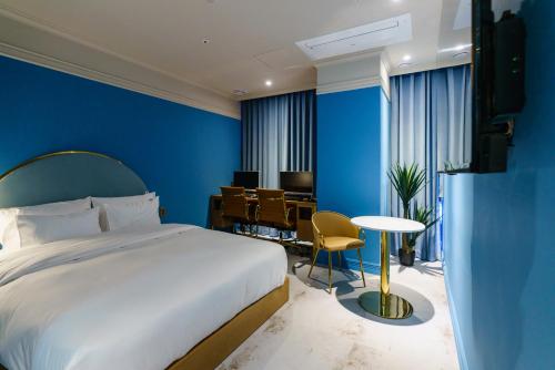 Postel nebo postele na pokoji v ubytování Yangju Hotel Ippda