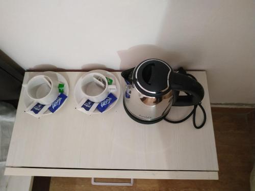 Kaffee-/Teezubehör in der Unterkunft HOTEL MANISHA